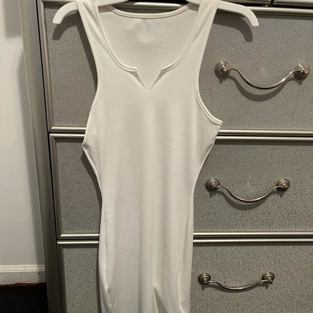 Tight fitted white tiny vneck dress